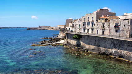 Fototapeta na wymiar Coast of Ortigia island, historical centre of the city of Syracuse, Sicily.