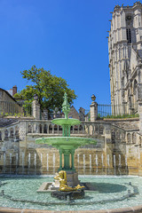 Limestone staircase and fountain date to 1853 near Le Mans Roman Catholic cathedral of Saint Julien...