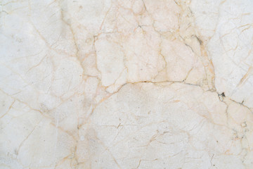 Cracks of gray marble. Wall of house. Construction industry.