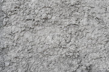 Gray stucco on wall of house. Construction industry.