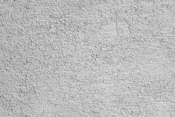 Gray stucco on wall of house. Construction industry.
