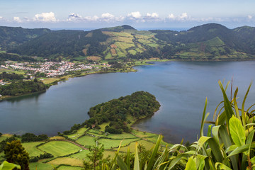 Fototapeta na wymiar Viewpoint Miradouro do Cerrado das Freiras - view of Lagoa Azul and the village Sete Cidades in Azores