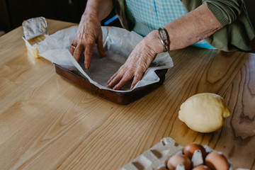 woman in the kitchen making christmas desserts or pastries