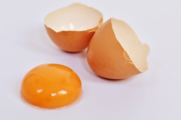 Egg yolk on the white background