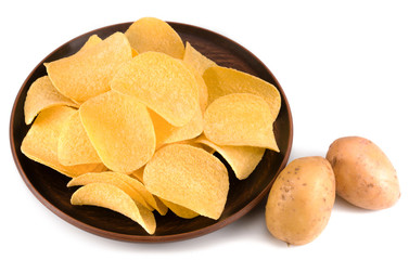 Crispy potato chips, in a plate, on a white background.