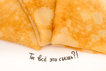 Three pancakes and the inscription Do you eat all this, in Russian