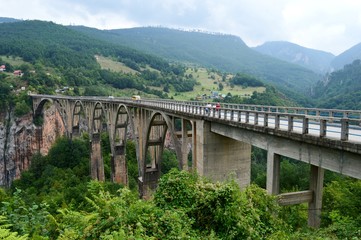 Fototapeta na wymiar a large bridge between the hills