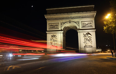 Fototapeta na wymiar Arc de Triomphe at night in Paris, France