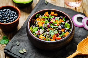 Black bean roasted sweet potato pepita avocado salad