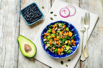 Black bean roasted sweet potato pepita avocado salad