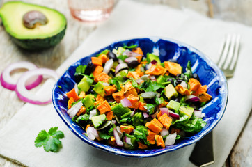 Black bean roasted sweet potato pepita avocado salad