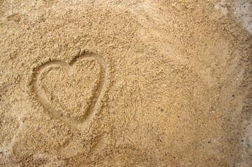 A heart in the sand with copy space