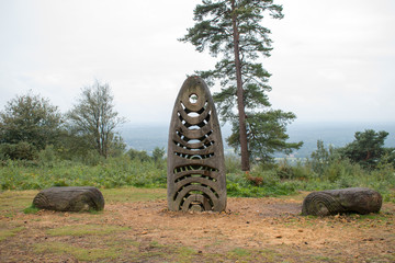 English totem in the forest opening