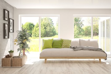 Fototapeta premium Stylish room in white color with sofa and summer landscape in window. Scandinavian interior design. 3D illustration
