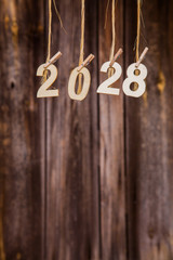 New year calendar 2028 concept on old brown wood