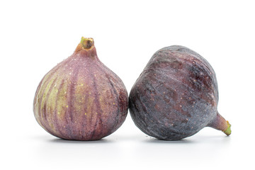 Group of two whole fresh fig fruit isolated on white background