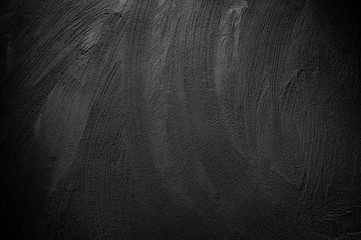Wall panel grunge black or dark grey concrete background.Backdrop Dirty,dust black wall concrete,cement blackboard texture and splash brush stroke for architecture or abstract background.