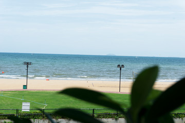 Beautiful Coastal views with sandy beach, blue ocean and clear skyline.