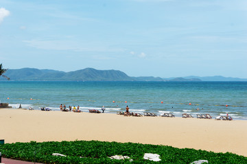 Beautiful Coastal views with sandy beach, blue ocean and clear skyline.