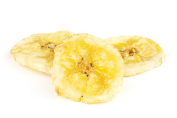 Group of three slices of sweet yellow dry banana isolated on white background