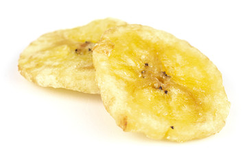 Group of two slices of sweet yellow dry banana isolated on white background