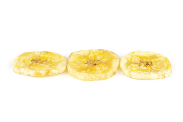 Group of three slices of sweet yellow dry banana in row isolated on white background
