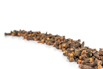 Lot of whole dry brown clove isolated on white background
