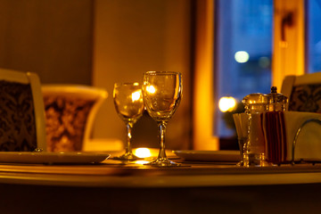 Laid table in the restaurant waiting for guests.