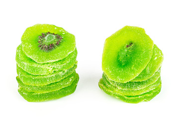Group of ten slices of sweet green candied kiwifruit isolated on white background