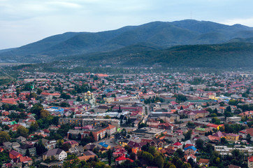 Fototapeta na wymiar Top view on the evening city of Khust, Transcarpathia Ukraine