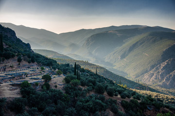 Fototapeta na wymiar Ruins of Delphi in Parnasus Mountaintains in the early morning