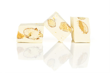 Group of three whole sweet white nougat isolated on white background