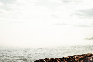 sea and foggy sky