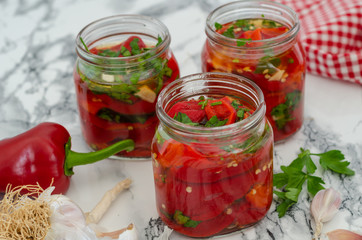 Fototapeta na wymiar Pickle jar for winter with roasted peppers