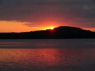 sunrise in red at the lake in Kitee