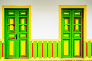 View on colorful door of colonial building in the city of Filandia, Colombia