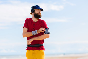 man young hipster training by the sea  © suszczynski
