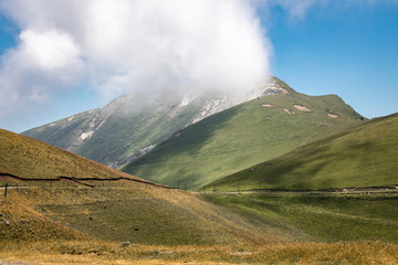 beautiful scenic view on iraty hills covered by clouds, basque country