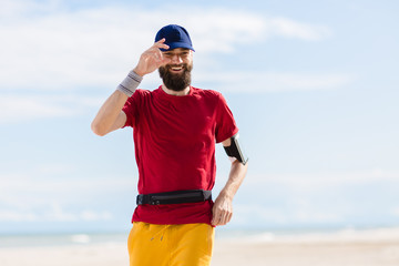 man young hipster training by the sea 