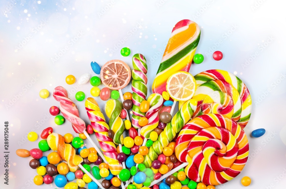 Wall mural Colorful candies, jelly and marmalade. Isolated on  background