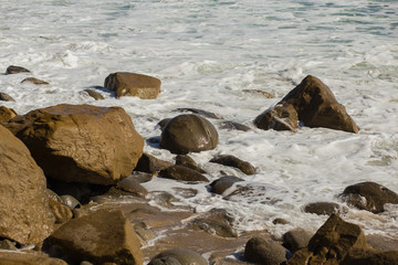 Stones with strange signs on the coastline of the Black Sea. Traces of the dead of unknown civilizations. Geological mysterious formations. Byala, Varna Province, Bulgaria.