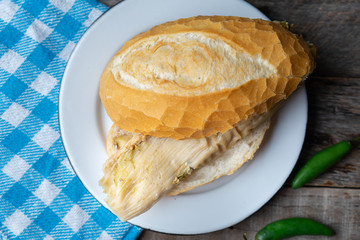 Mexican green tamal sandwich also called 