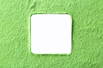 Frame made of wheat grass powder on white background, top view. Space for text