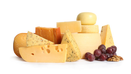 Composition with cheese, grapes and walnuts on white background