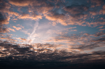 Fototapeta premium Beautiful blue sky with white clouds and natural colors at sunset