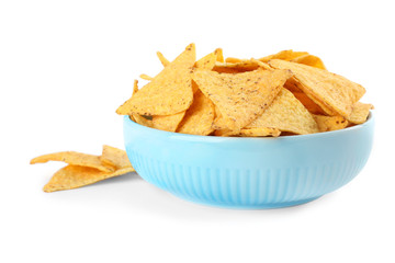 Bowl with tasty Mexican nachos chips on white background