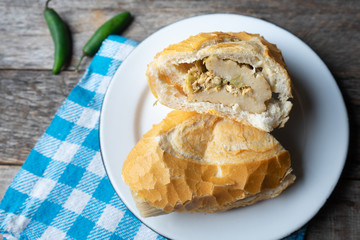 Mexican green tamal sandwich also called 