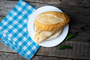 Mexican green tamal sandwich also called 