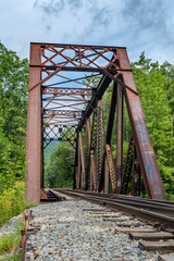 Abandoned railroad testle against the sky