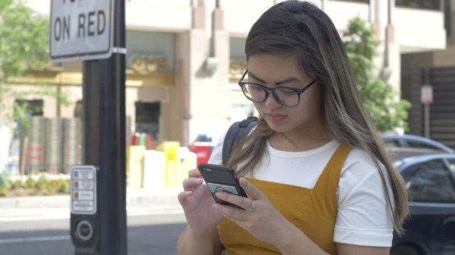 Young Millennial texts in City
